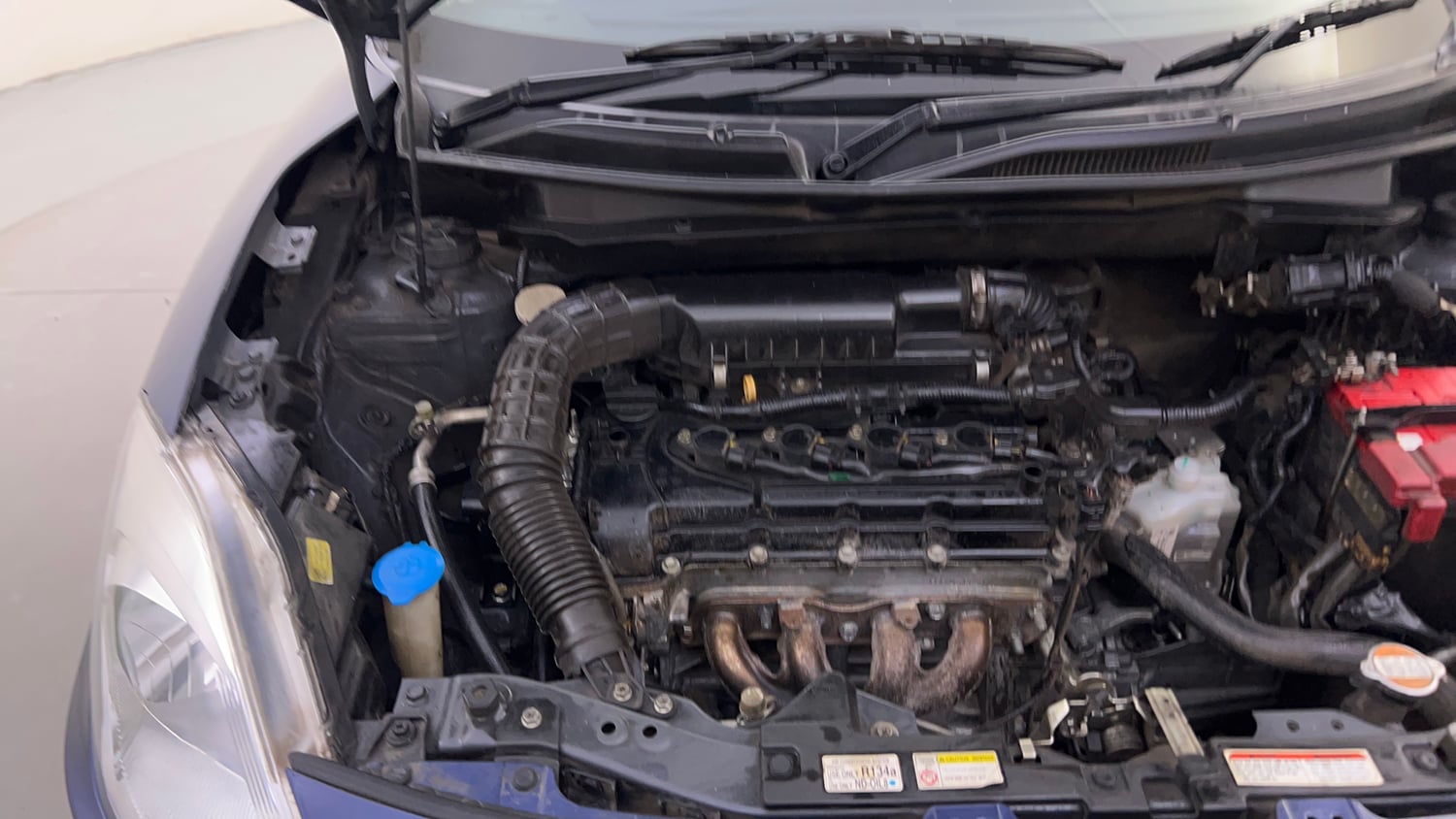 Used 2017 Maruti Suzuki Dzire VXi AMT Petrol Automatic engine ENGINE RIGHT SIDE HINGE & APRON VIEW