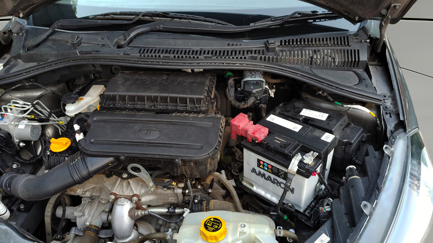 Used 2025 Tata Tigor XZ Plus LUX Petrol Manual engine ENGINE LEFT SIDE HINGE & APRON VIEW