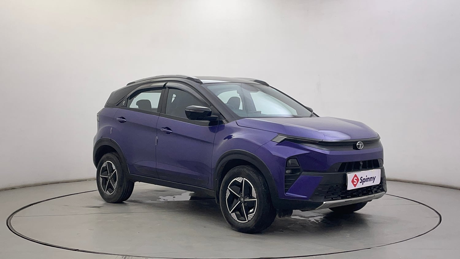 Used 2023 Tata Nexon Fearless Plus S Purple 1.2 Revotron Petrol 7DCA Dual Tone Petrol Automatic exterior RIGHT FRONT CORNER VIEW