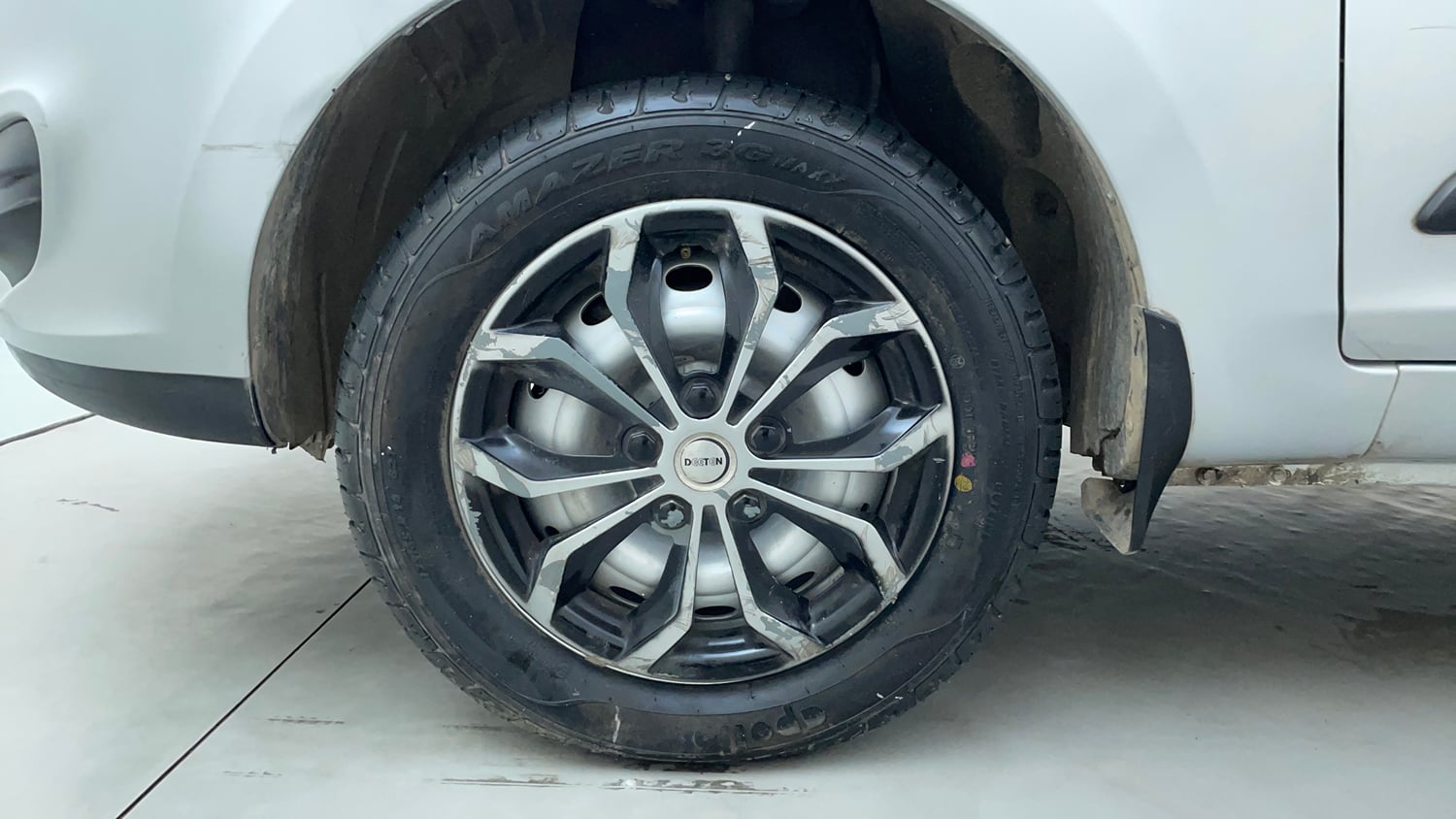 Used 2017 Tata Zest XE Petrol Petrol Manual tyres LEFT FRONT TYRE RIM VIEW