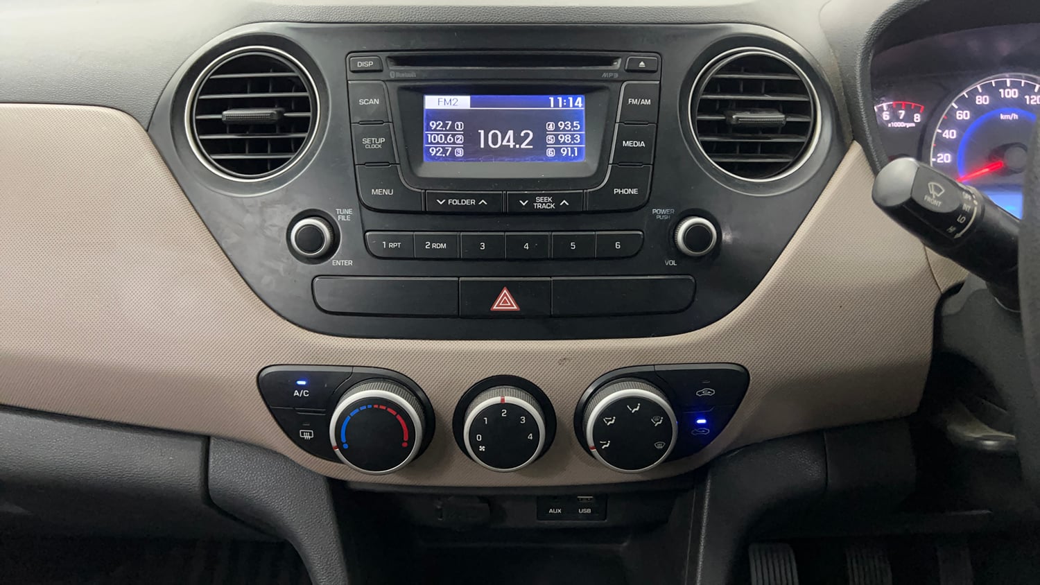 Used 2016 Hyundai Grand i10 Sportz 1.2 Kappa VTVT Petrol Manual interior MUSIC SYSTEM & AC CONTROL VIEW