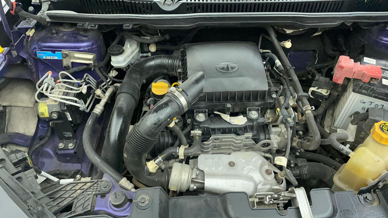 Used 2023 Tata Nexon Fearless Plus S Purple 1.2 Revotron Petrol 7DCA Dual Tone Petrol Automatic engine ENGINE RIGHT SIDE VIEW