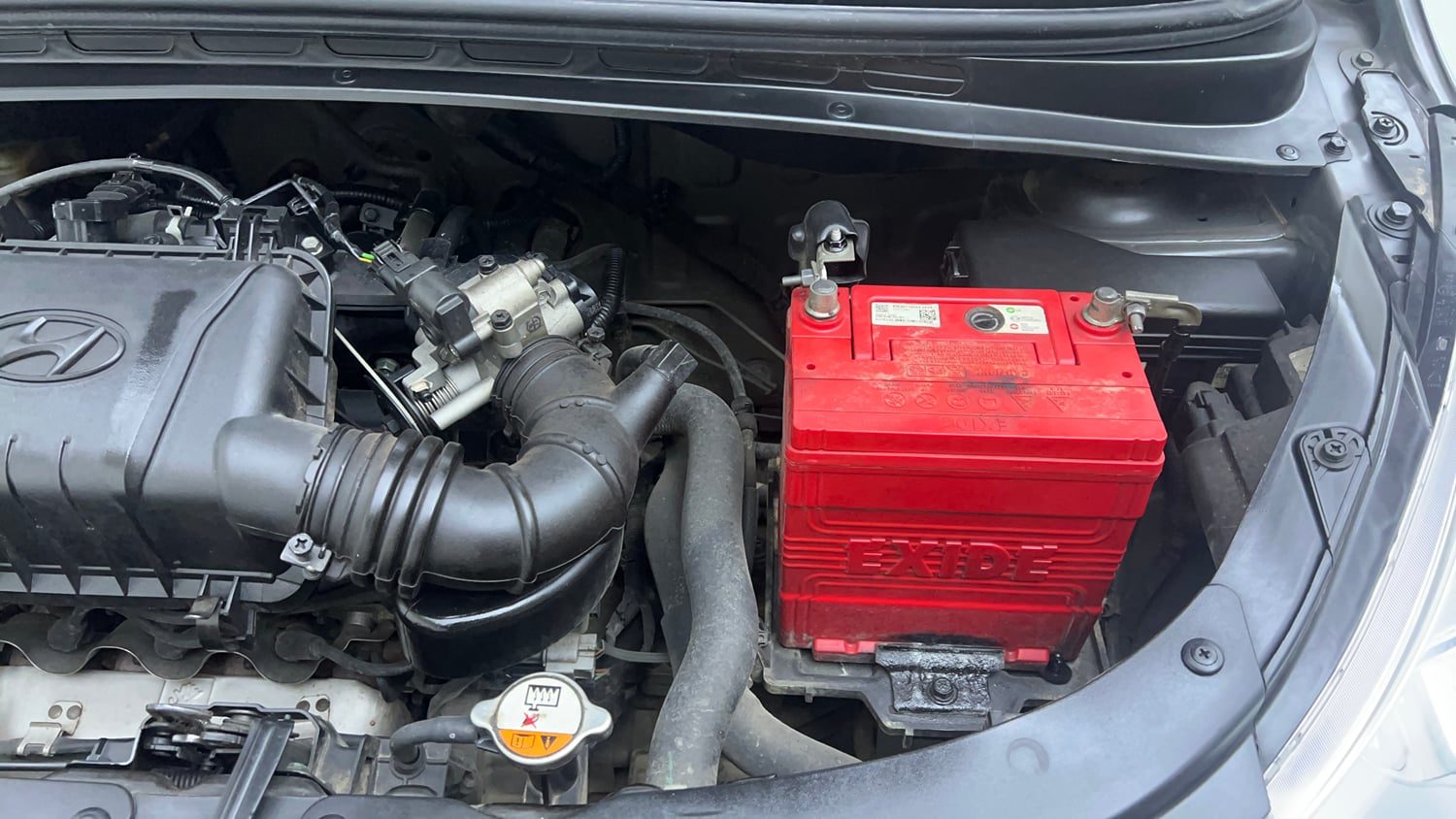 Used 2016 Hyundai i10 Sportz 1.1 iRDE2 Petrol Manual engine ENGINE LEFT SIDE VIEW