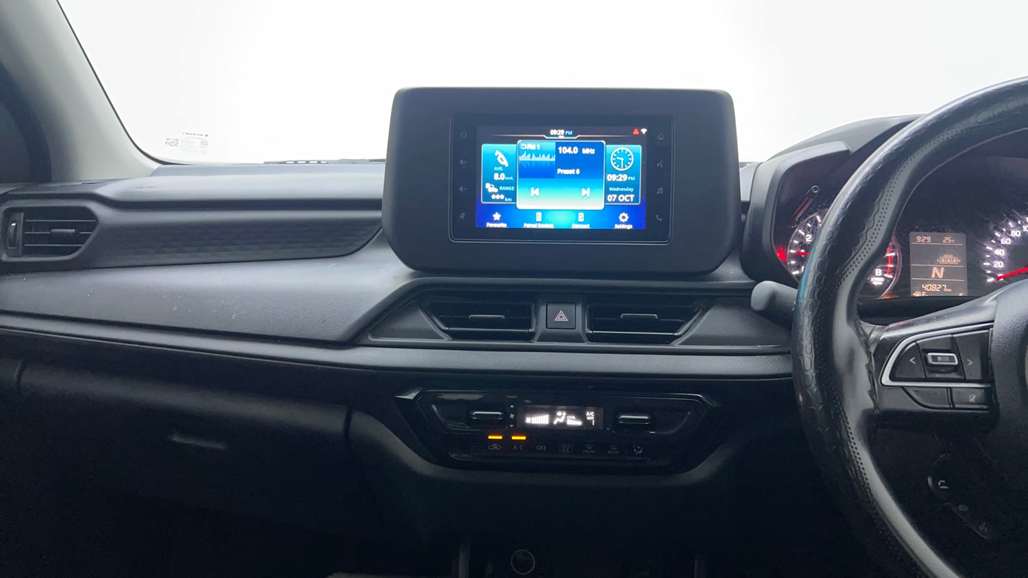 Used 2024 Maruti Suzuki Swift VXi (O) AMT Petrol Automatic top_features Integrated (in-dash) music system