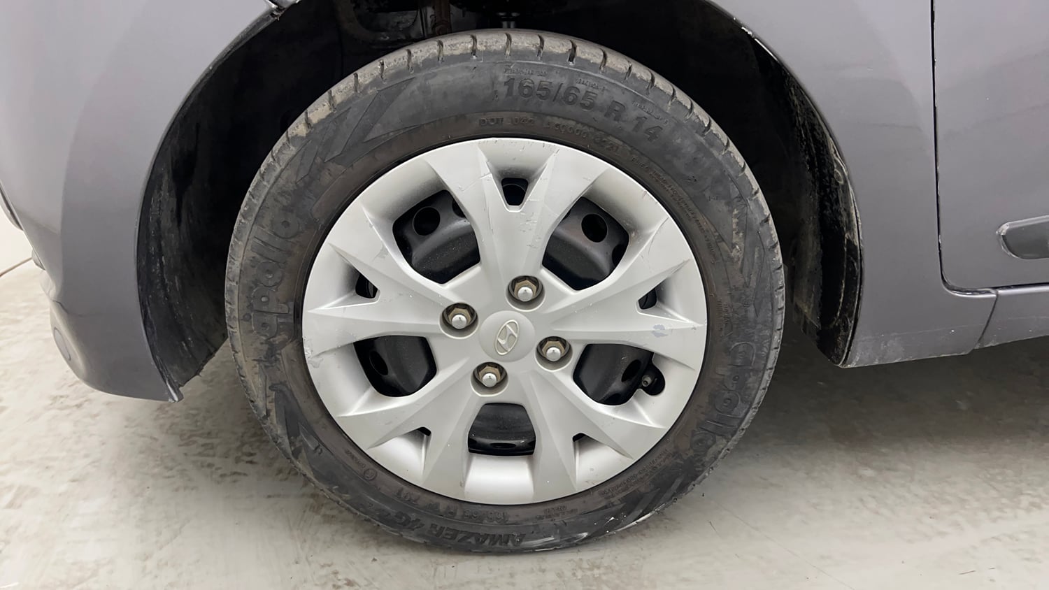 Used 2016 Hyundai Grand i10 Sportz 1.2 Kappa VTVT Petrol Manual tyres LEFT FRONT TYRE RIM VIEW