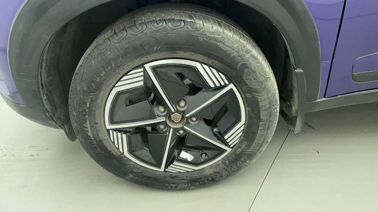 Used 2023 Tata Nexon Fearless Plus S Purple 1.2 Revotron Petrol 7DCA Dual Tone Petrol Automatic tyres LEFT FRONT TYRE RIM VIEW