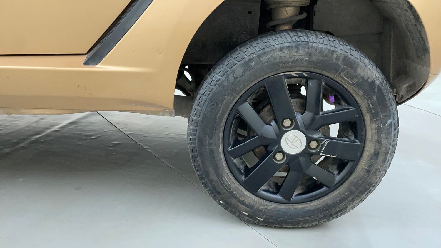 Used 2015 Tata Nano Twist XTA Petrol Automatic tyres LEFT REAR TYRE RIM VIEW