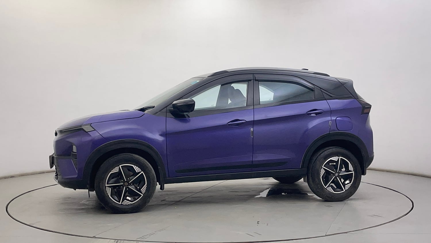 Used 2023 Tata Nexon Fearless Plus S Purple 1.2 Revotron Petrol 7DCA Dual Tone Petrol Automatic exterior LEFT SIDE VIEW