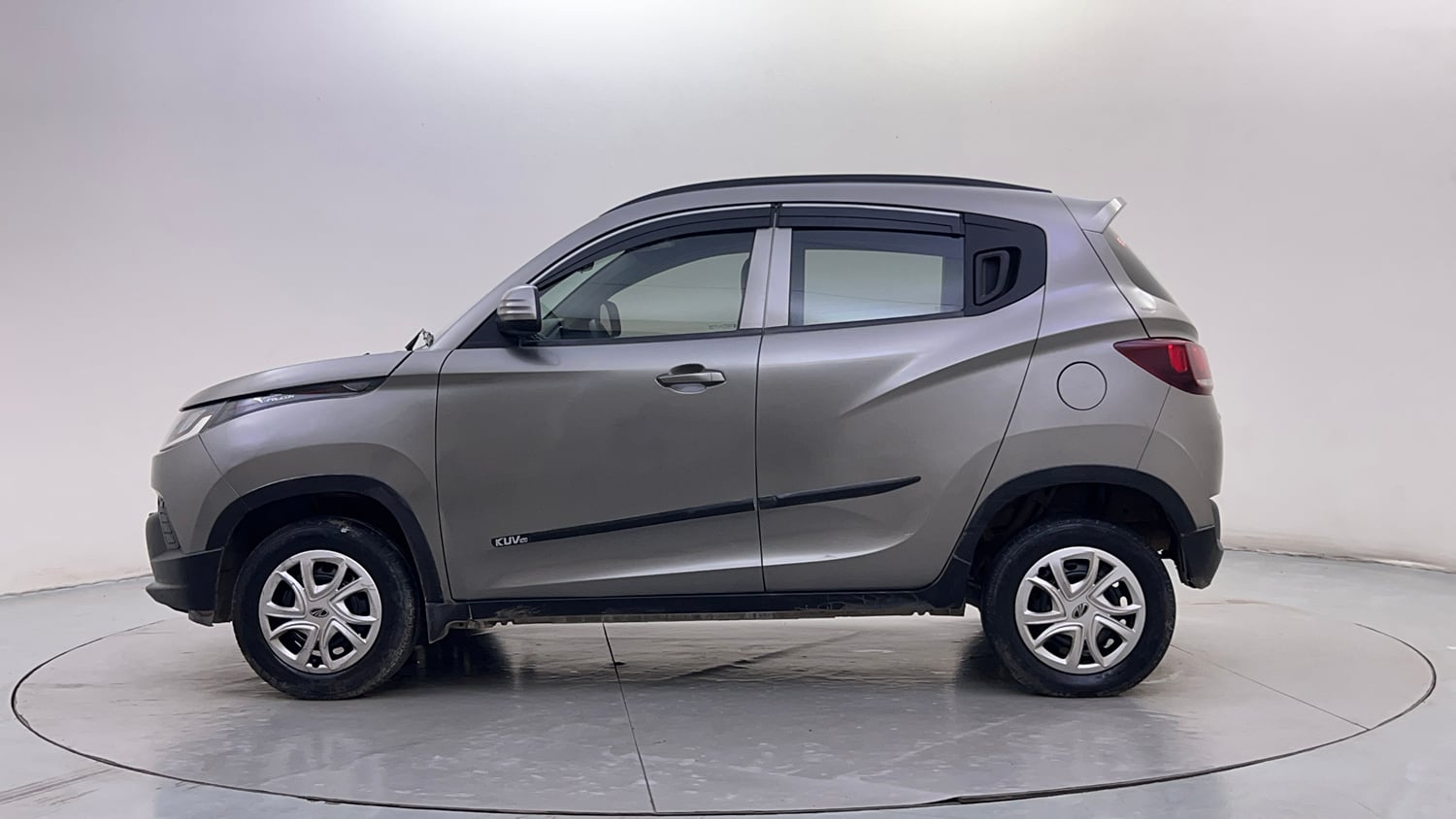 Used 2017 Mahindra KUV100 K4 6 STR Petrol Manual exterior LEFT SIDE VIEW