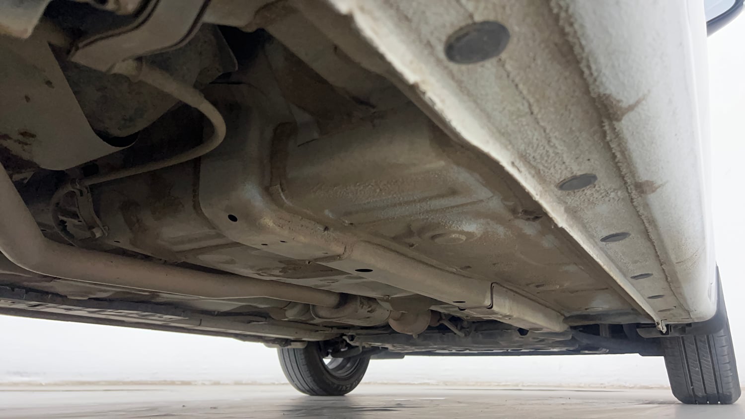 Used 2024 Hyundai Grand i10 Nios Asta 1.2 Kappa AMT Petrol Automatic extra REAR RIGHT UNDERBODY VIEW