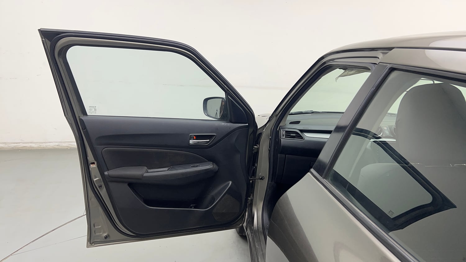 Used 2020 Maruti Suzuki Swift VXi Petrol Manual interior LEFT FRONT DOOR OPEN VIEW