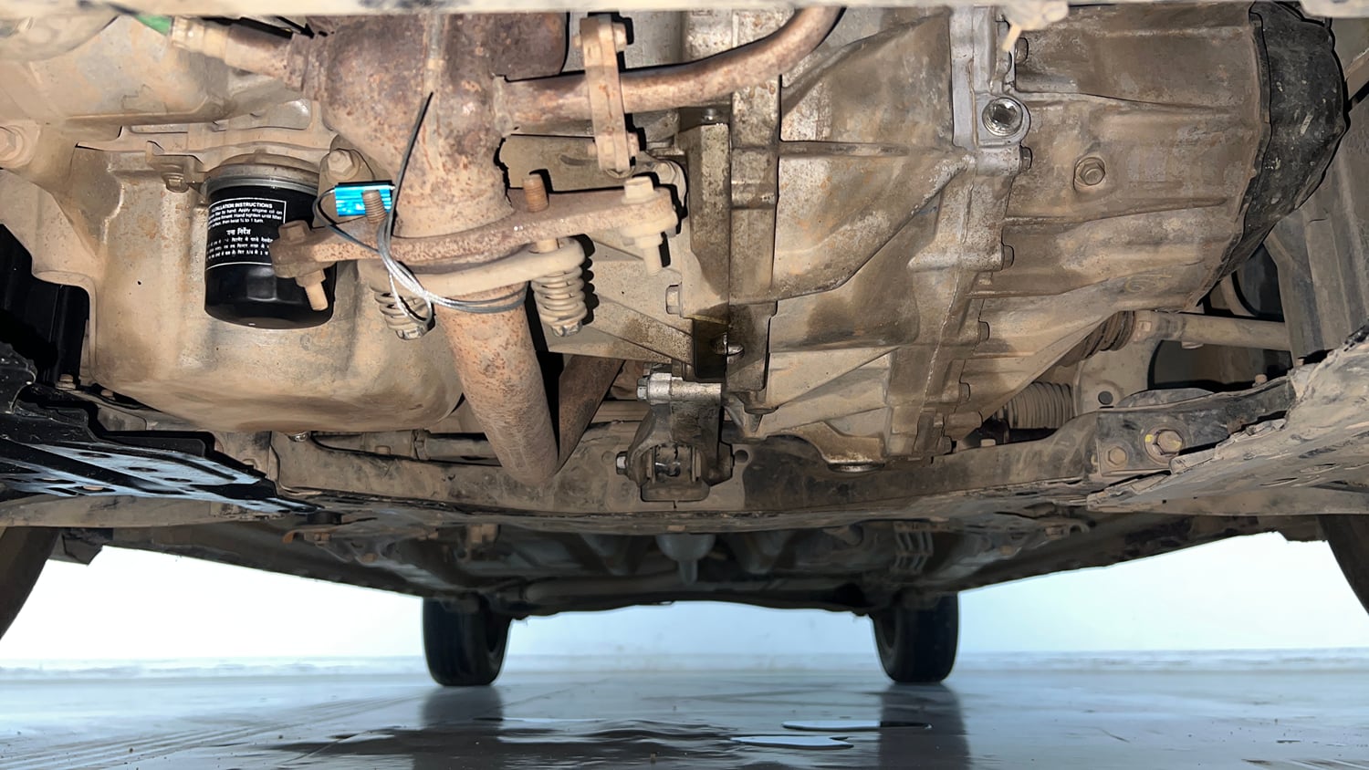 Used 2022 Maruti Suzuki XL6 Alpha Plus MT Petrol Petrol Manual extra FRONT LEFT UNDERBODY VIEW