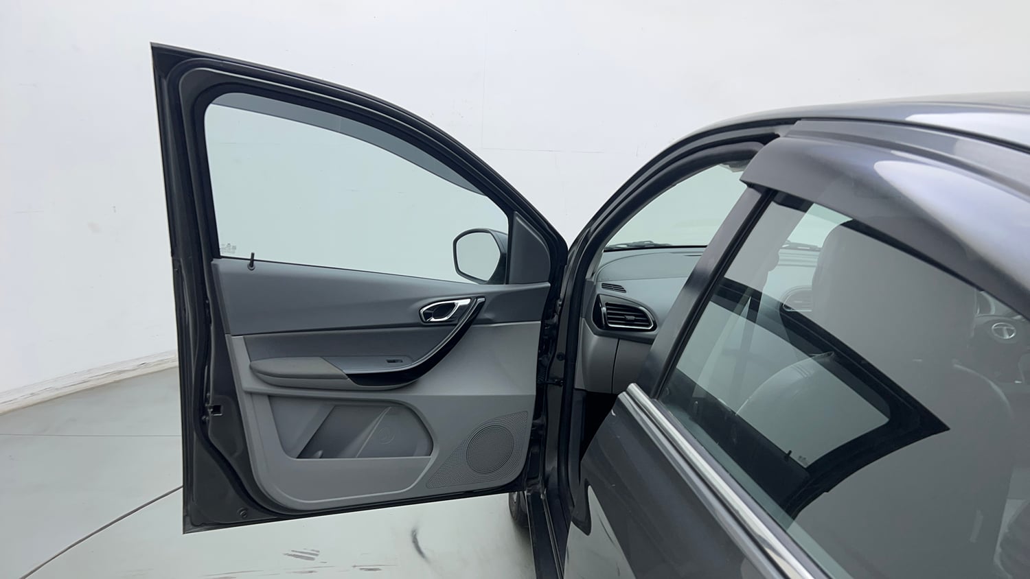 Used 2021 Tata Tigor XZ Plus Petrol Manual interior LEFT FRONT DOOR OPEN VIEW