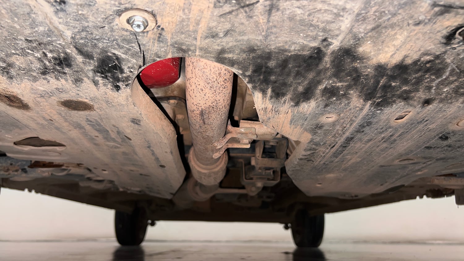 Used 2017 Mahindra KUV100 K4 6 STR Petrol Manual extra FRONT LEFT UNDERBODY VIEW