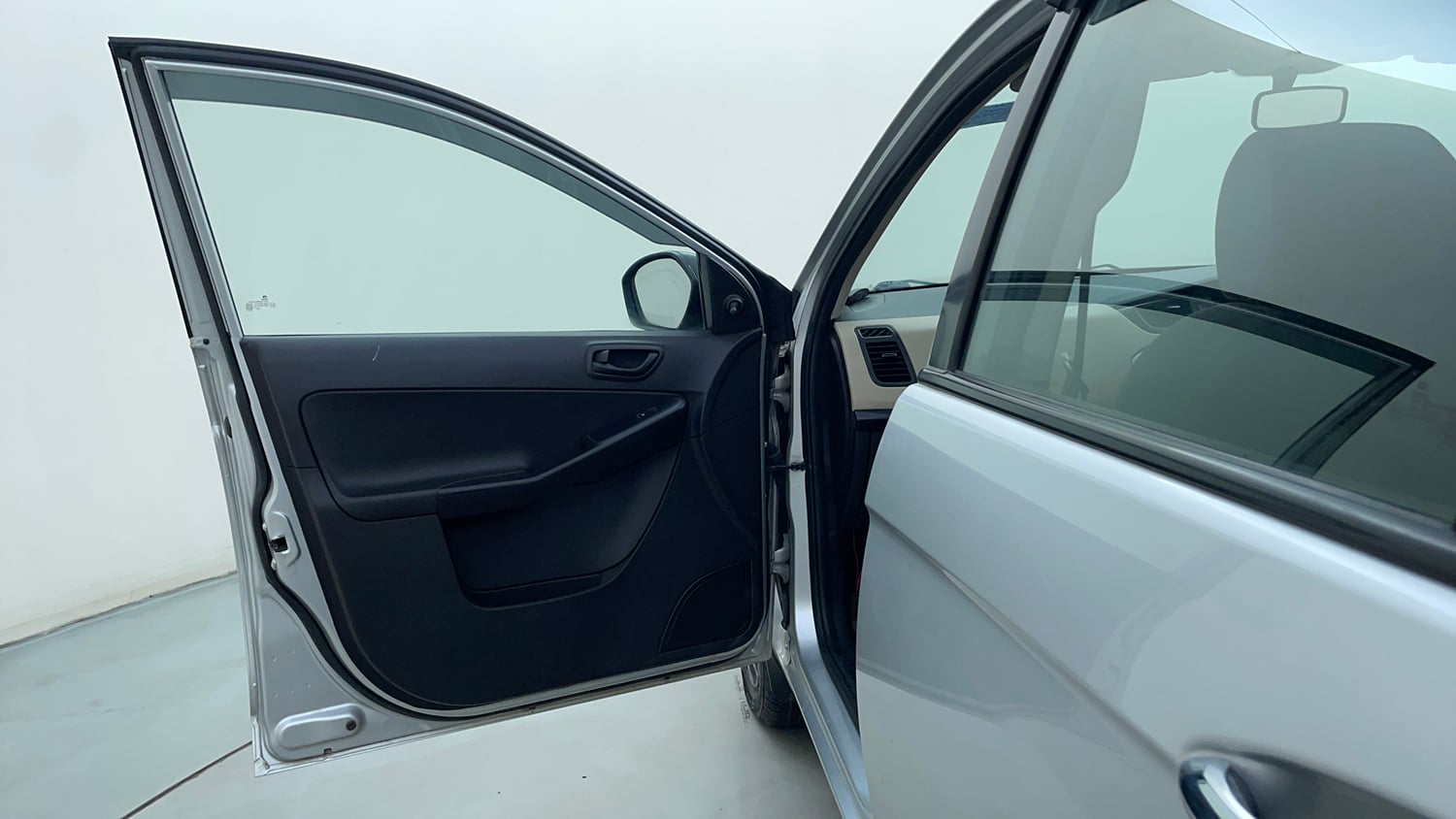 Used 2017 Tata Zest XE Petrol Petrol Manual interior LEFT FRONT DOOR OPEN VIEW