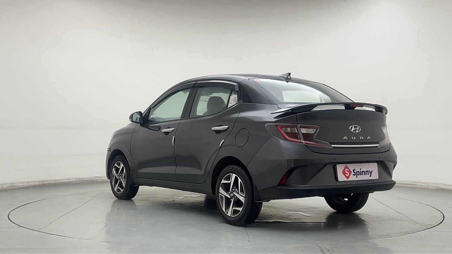 Used 2023 Hyundai Aura SX 1.2 Petrol Petrol Manual exterior LEFT REAR CORNER VIEW
