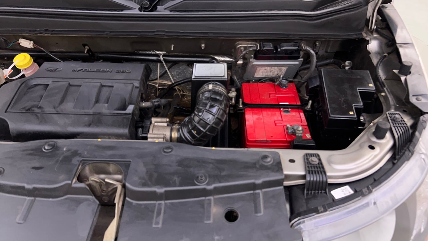 Used 2017 Mahindra KUV100 K4 6 STR Petrol Manual engine ENGINE LEFT SIDE VIEW