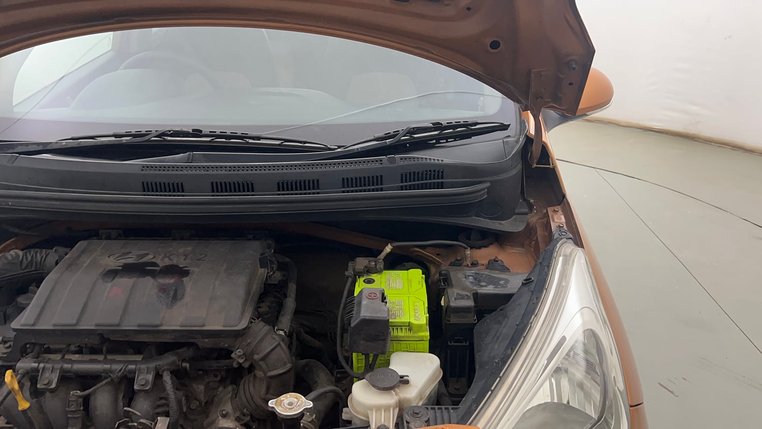 Used 2017 Hyundai Grand i10 Sportz (O) 1.2 Kappa VTVT Petrol Manual engine ENGINE LEFT SIDE HINGE & APRON VIEW