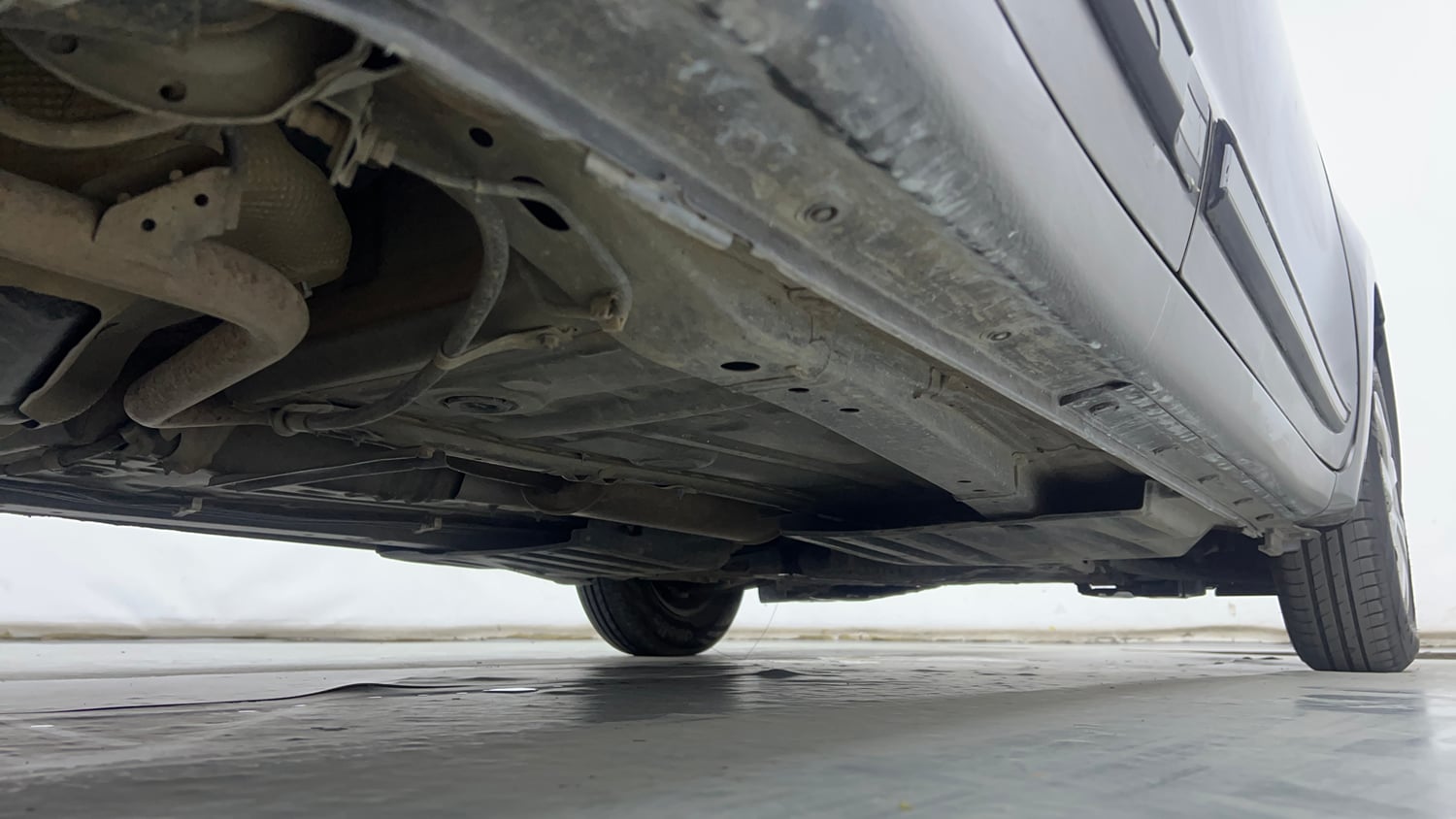 Used 2022 Maruti Suzuki Swift VXi Petrol Manual extra REAR RIGHT UNDERBODY VIEW