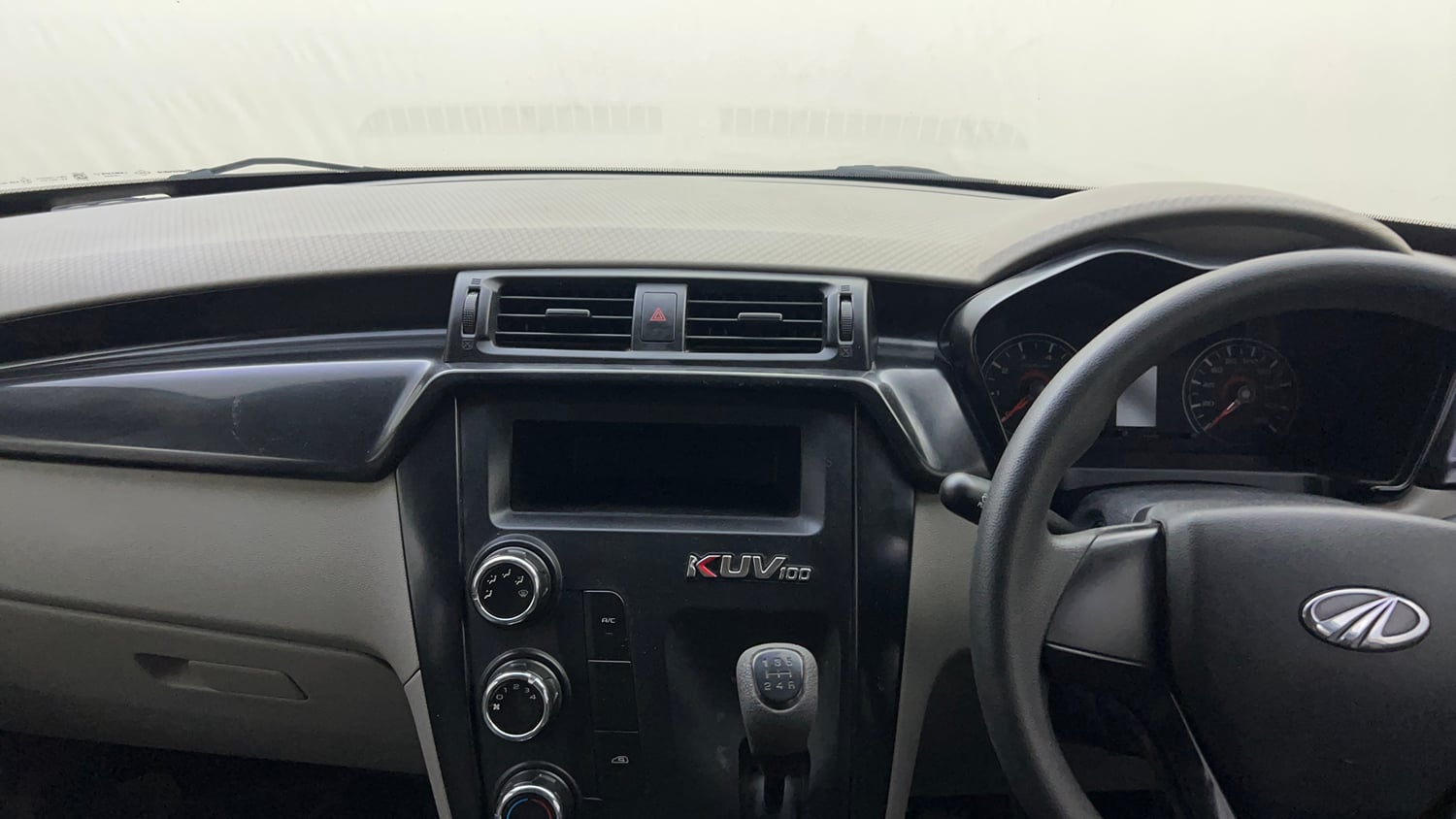 Used 2017 Mahindra KUV100 K4 6 STR Petrol Manual interior MUSIC SYSTEM & AC CONTROL VIEW