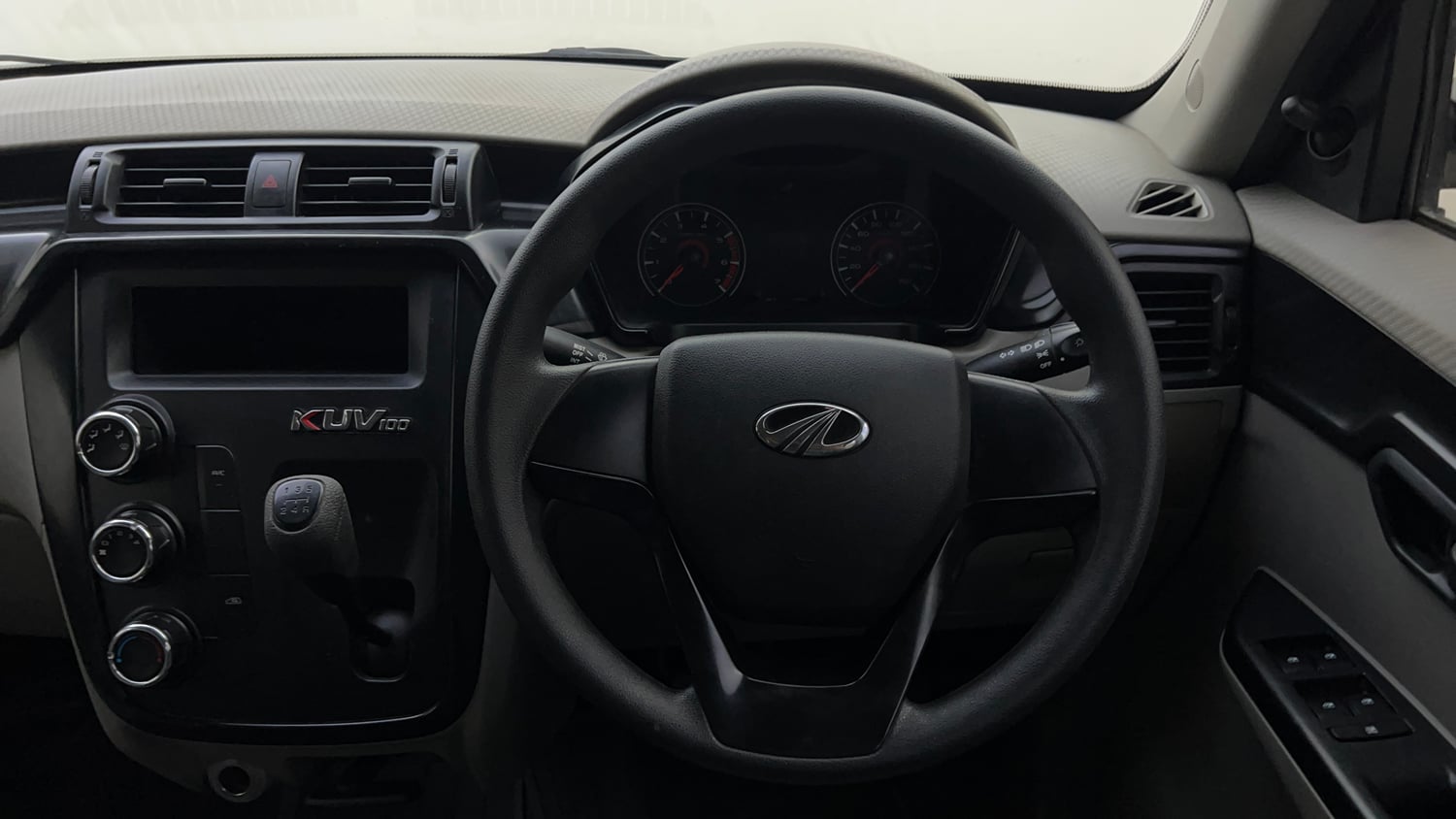 Used 2017 Mahindra KUV100 K4 6 STR Petrol Manual interior STEERING VIEW