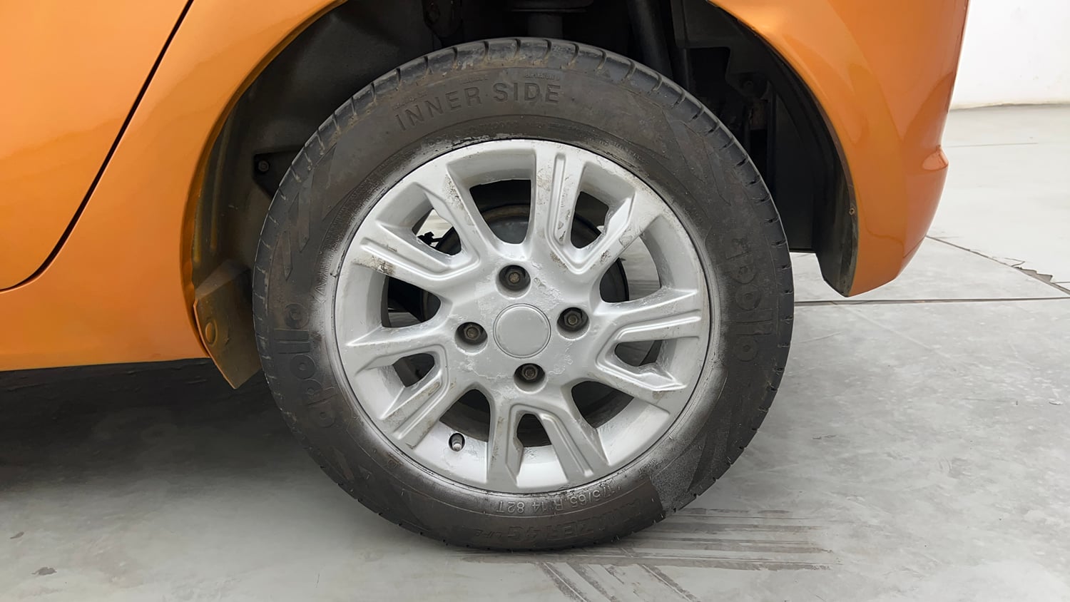 Used 2016 Tata Tiago Revotron XZ Petrol Manual tyres LEFT REAR TYRE RIM VIEW