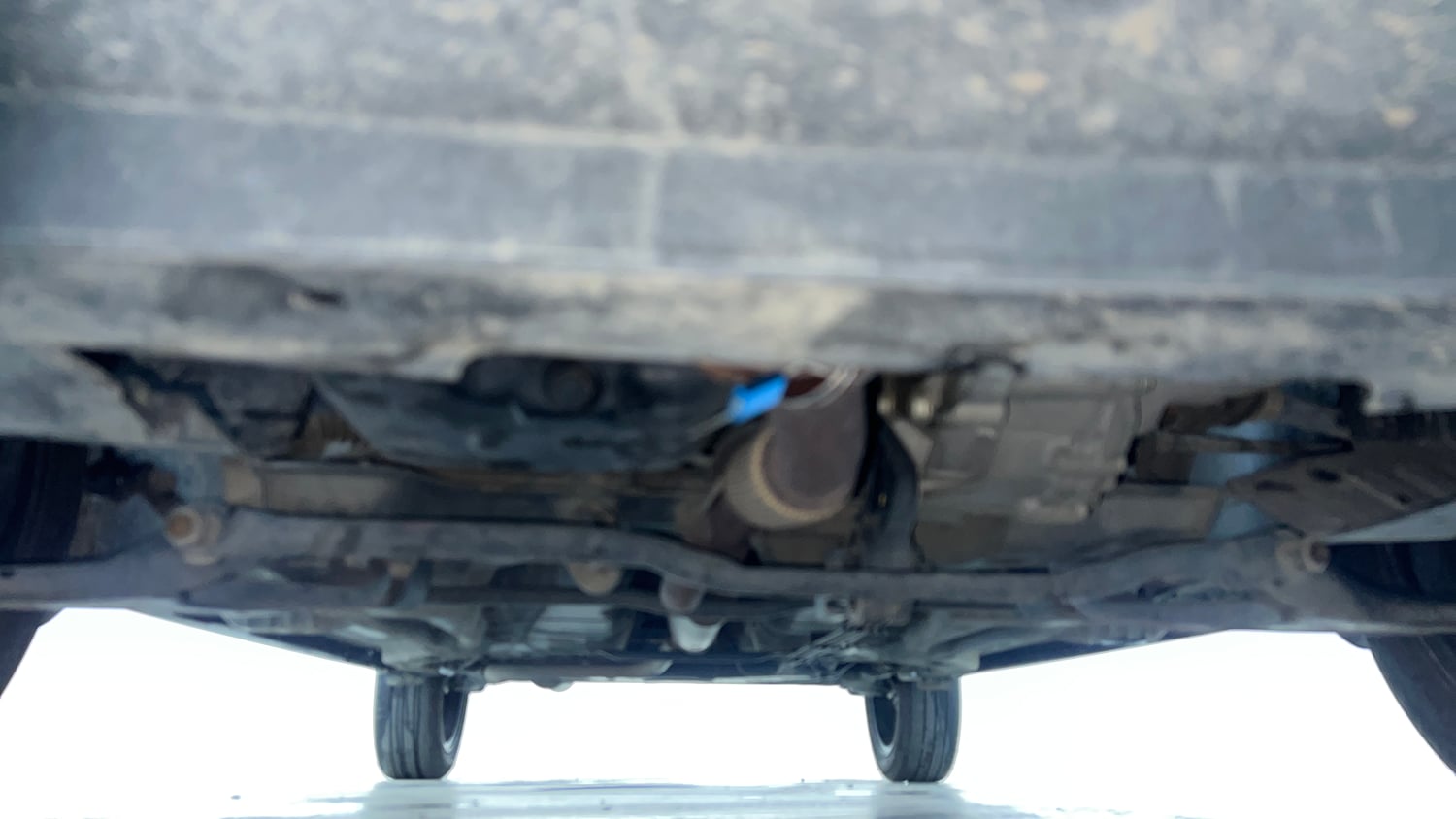 Used 2021 Tata Tigor XZ Plus Petrol Manual extra FRONT LEFT UNDERBODY VIEW