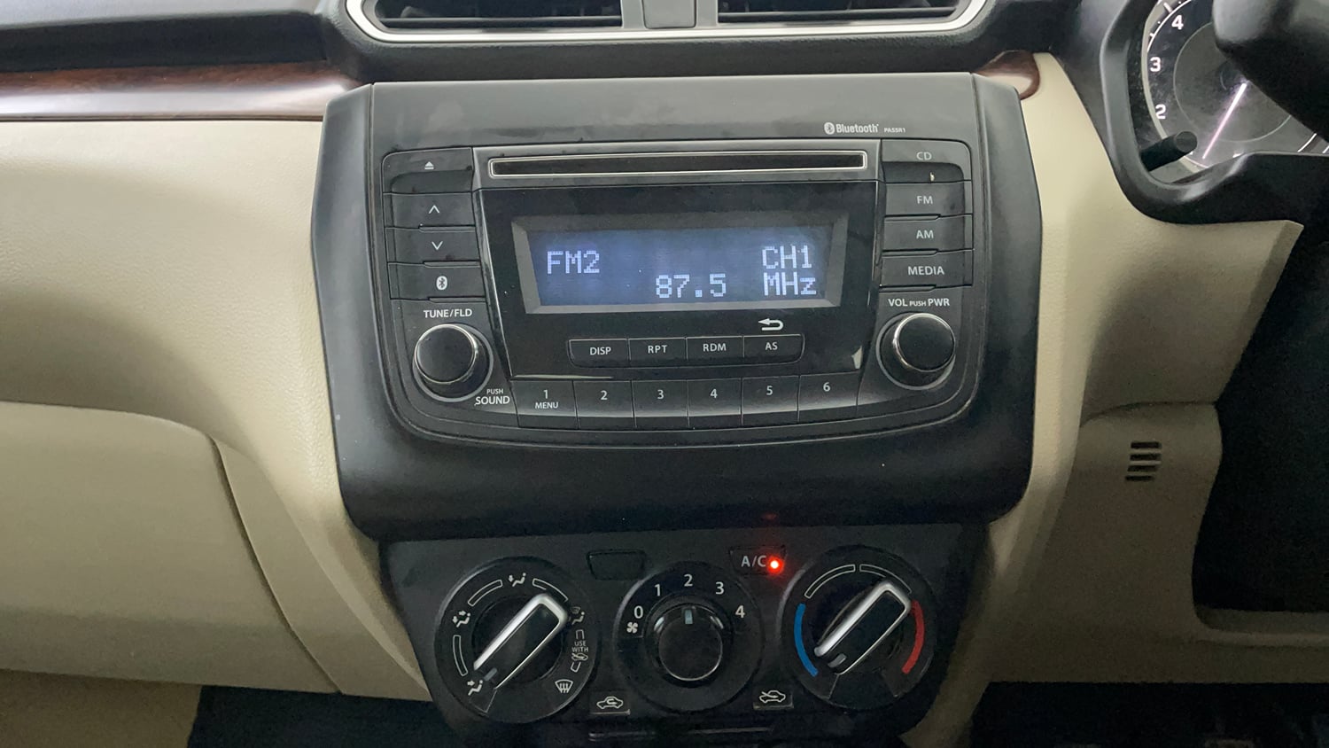 Used 2019 Maruti Suzuki Dzire VXi Petrol Manual interior MUSIC SYSTEM & AC CONTROL VIEW