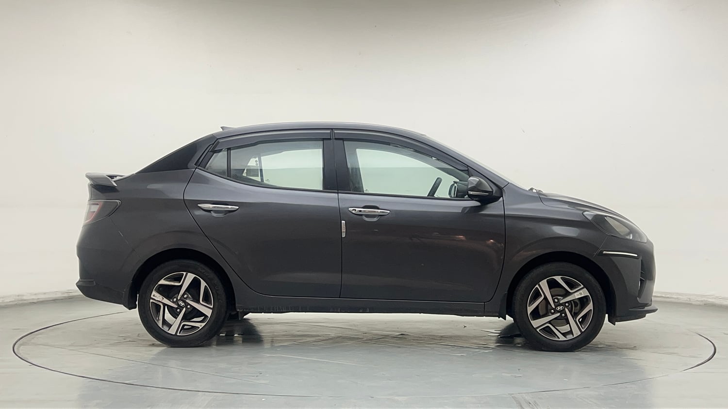 Used 2023 Hyundai Aura SX 1.2 Petrol Petrol Manual exterior RIGHT SIDE VIEW