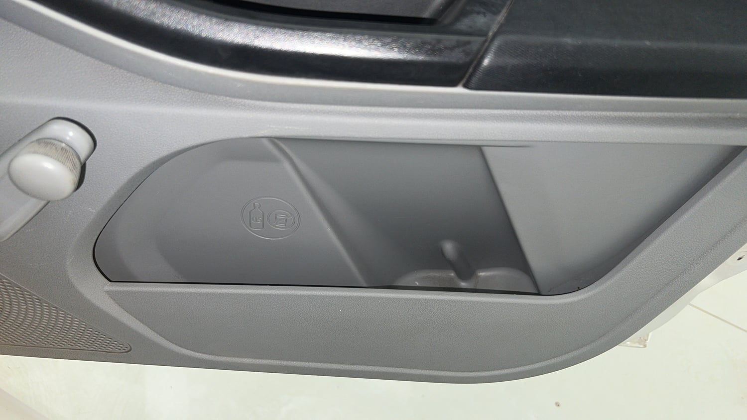 Used 2021 Tata Tiago XE Petrol Manual top_features Door pockets