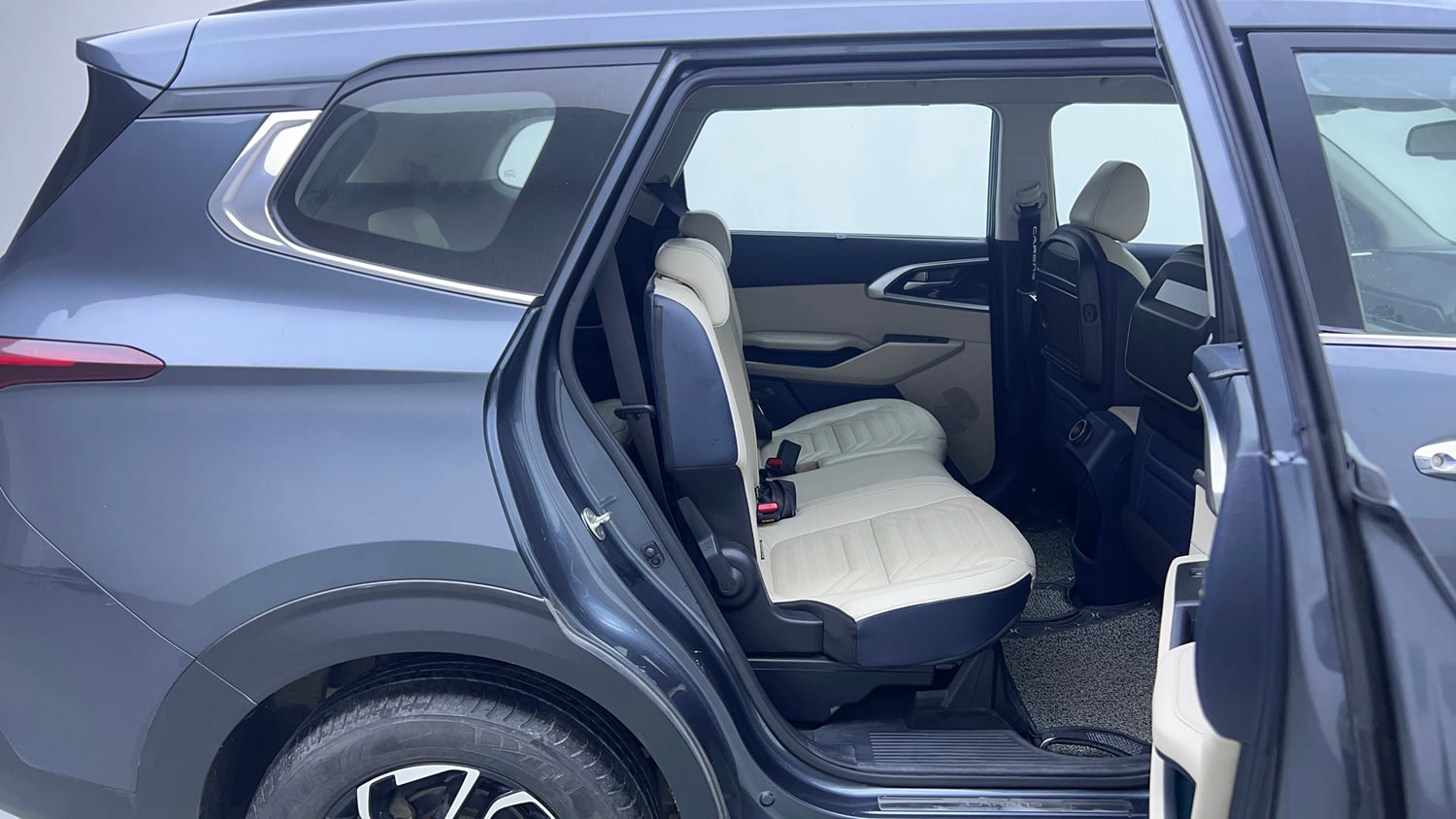 Used 2022 Kia Carens Luxury 1.4 Petrol 7 STR Petrol Manual interior RIGHT SIDE REAR DOOR CABIN VIEW