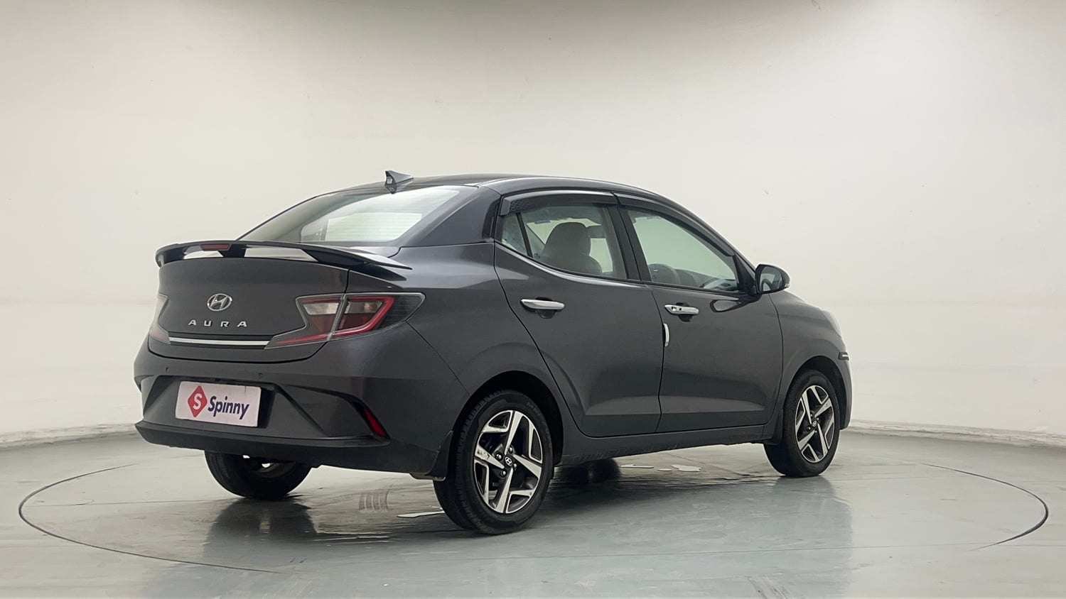 Used 2023 Hyundai Aura SX 1.2 Petrol Petrol Manual exterior RIGHT REAR CORNER VIEW