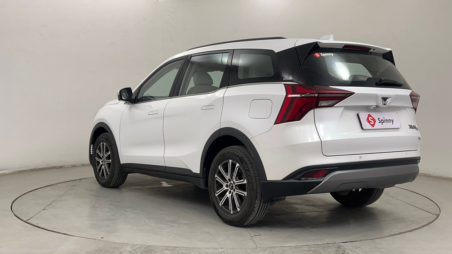 Used 2024 Mahindra XUV700 AX7 Luxury Pack Petrol AT 7 STR Petrol Automatic exterior LEFT REAR CORNER VIEW
