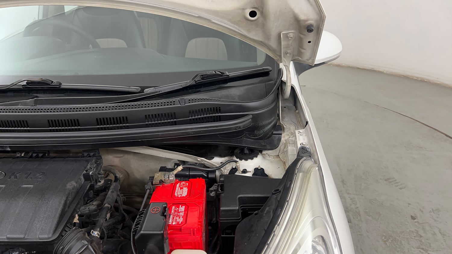 Used 2018 Hyundai Grand i10 Sportz (O) AT 1.2 Kappa VTVT Petrol Automatic engine ENGINE LEFT SIDE HINGE & APRON VIEW