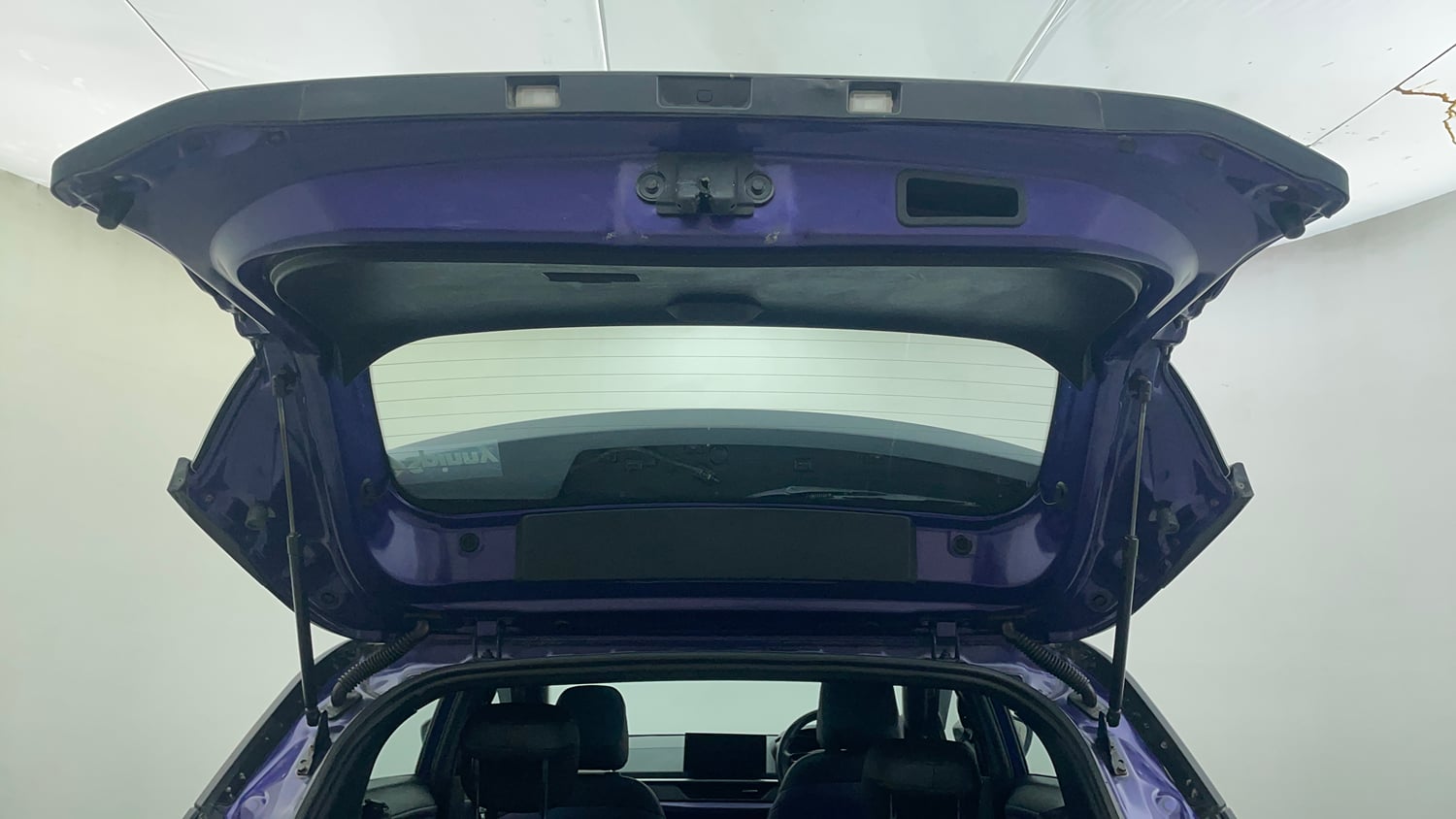 Used 2023 Tata Nexon Fearless Plus S Purple 1.2 Revotron Petrol 7DCA Dual Tone Petrol Automatic interior DICKY DOOR OPEN VIEW