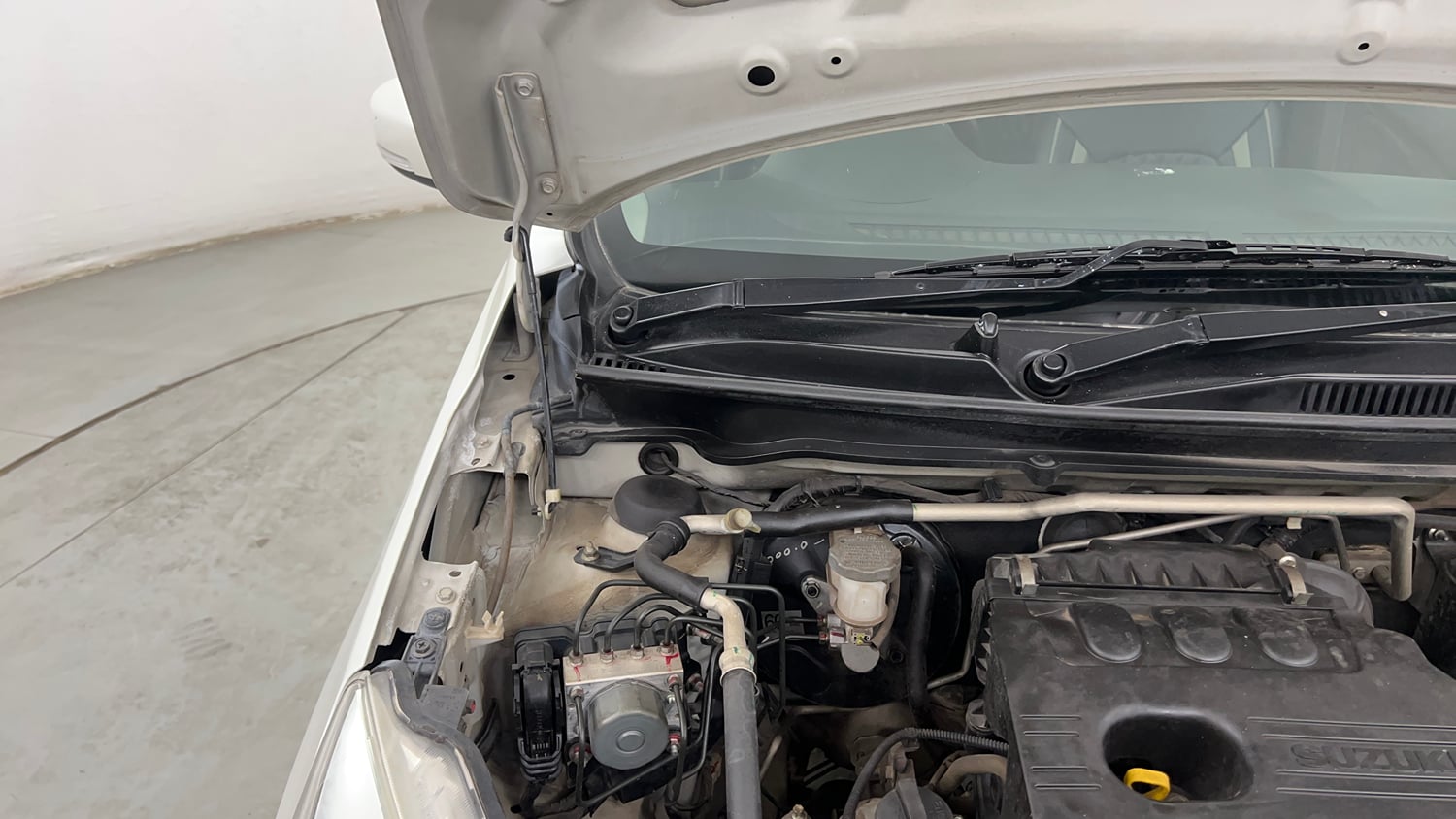 Used 2017 Maruti Suzuki Celerio ZXi Opt Petrol Manual engine ENGINE RIGHT SIDE HINGE & APRON VIEW
