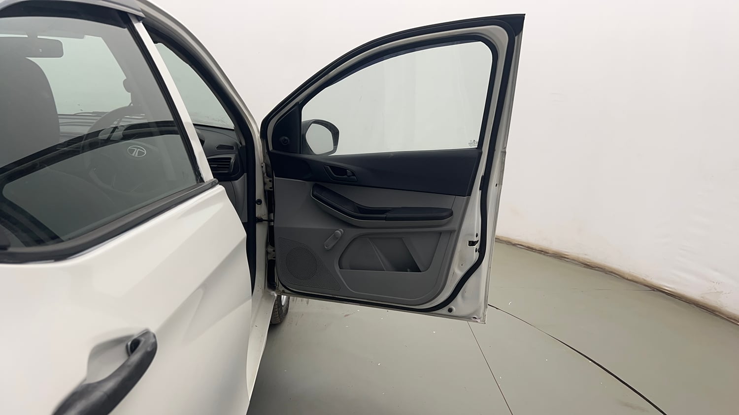 Used 2021 Tata Tiago XE Petrol Manual interior RIGHT FRONT DOOR OPEN VIEW