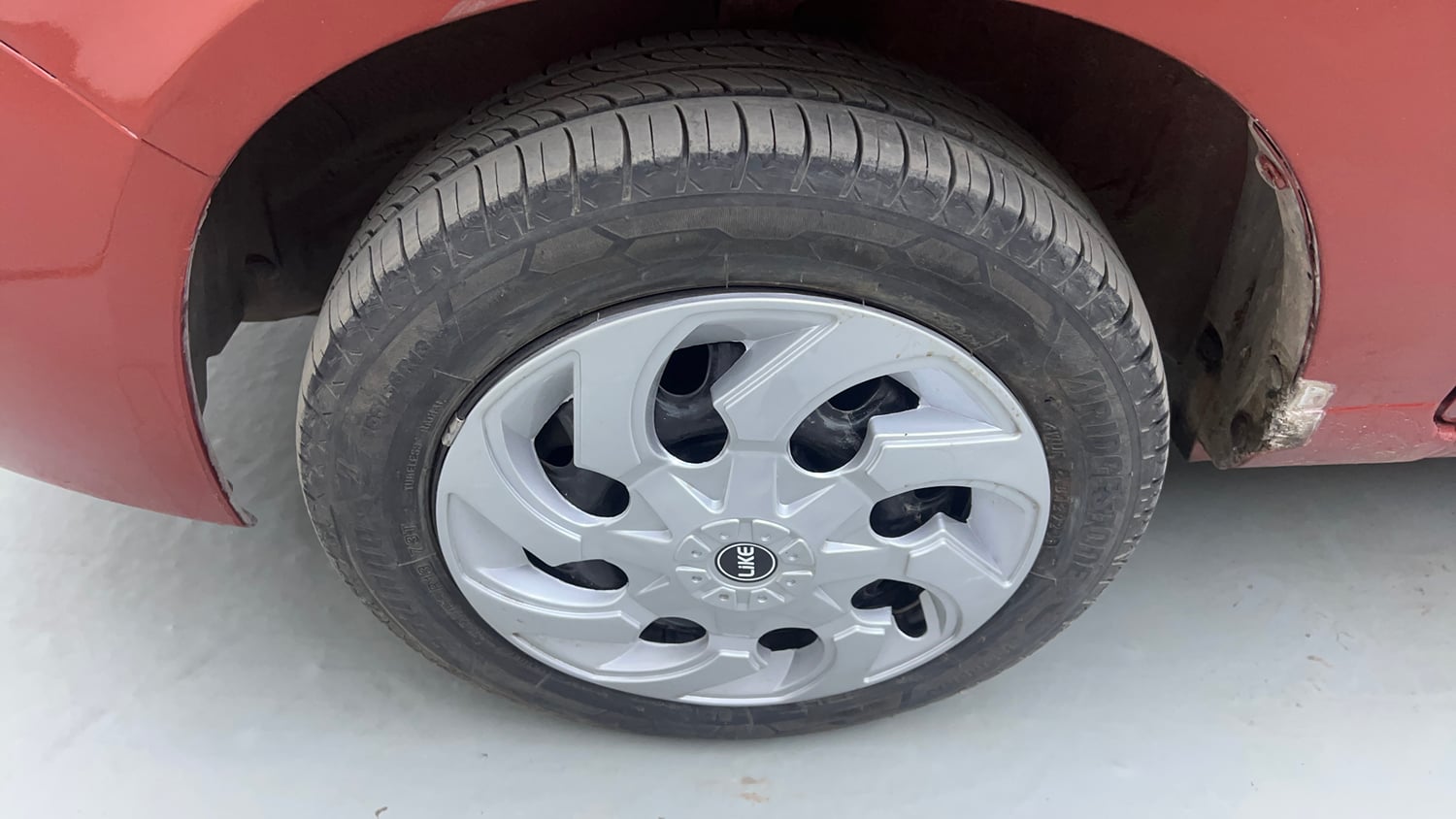 Used 2013 Maruti Suzuki Alto K10 VXi Petrol Manual tyres LEFT FRONT TYRE RIM VIEW