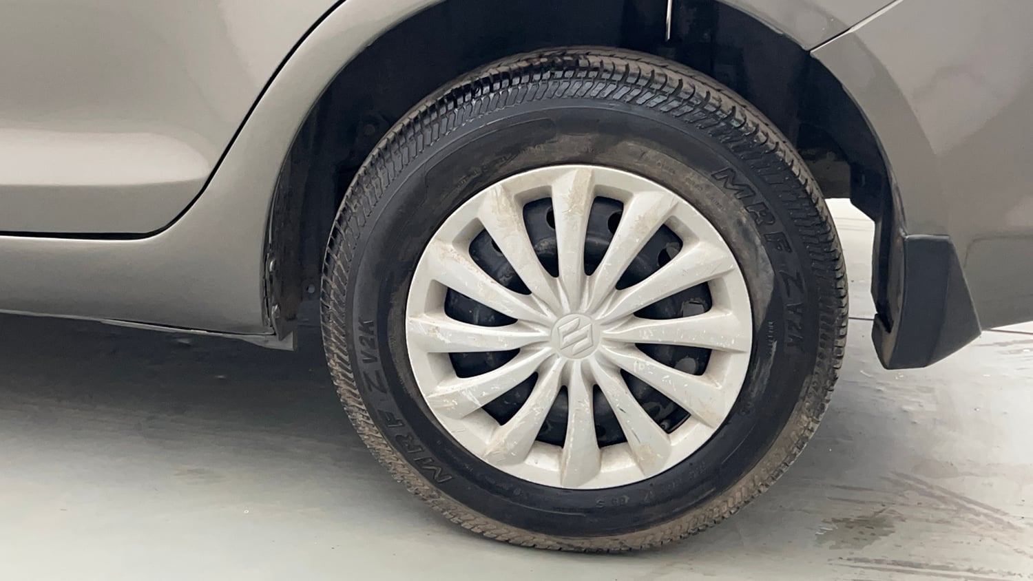 Used 2016 Maruti Suzuki Swift Dzire VXI Petrol Manual tyres LEFT REAR TYRE RIM VIEW