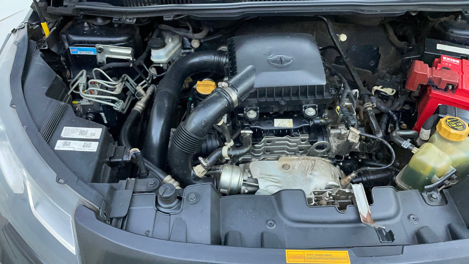 Used 2022 Tata Nexon XZA Plus (Premium) Dark Edition Petrol Automatic engine ENGINE RIGHT SIDE VIEW