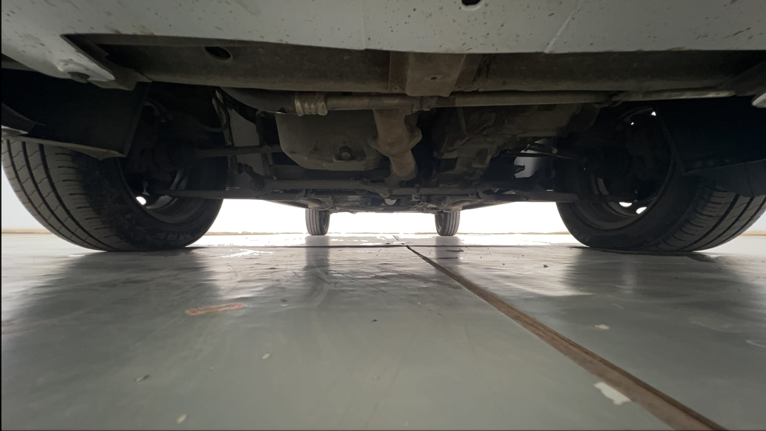 Used 2021 Tata Tiago XE Petrol Manual extra FRONT LEFT UNDERBODY VIEW
