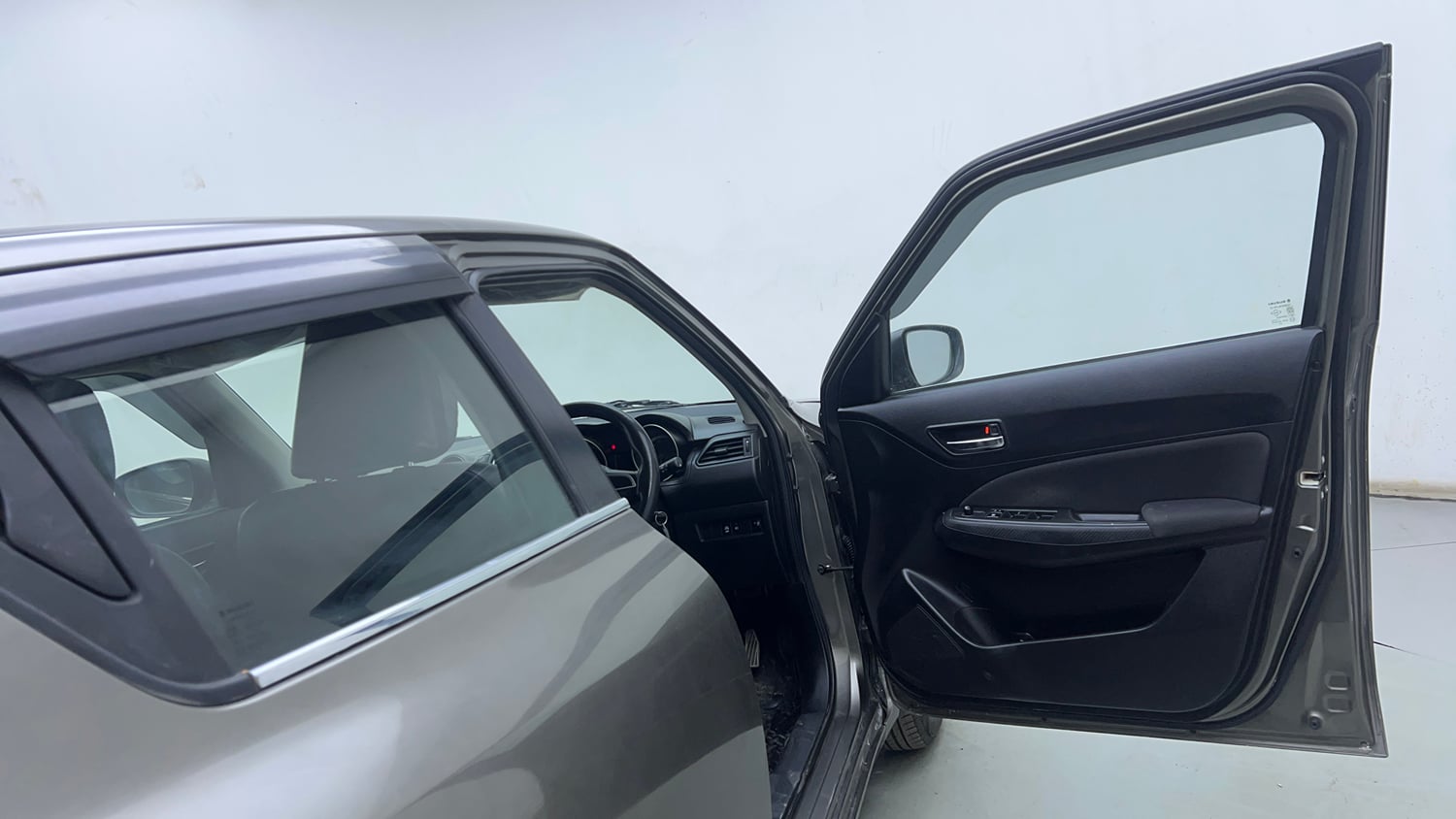 Used 2022 Maruti Suzuki Swift VXi Petrol Manual interior RIGHT FRONT DOOR OPEN VIEW
