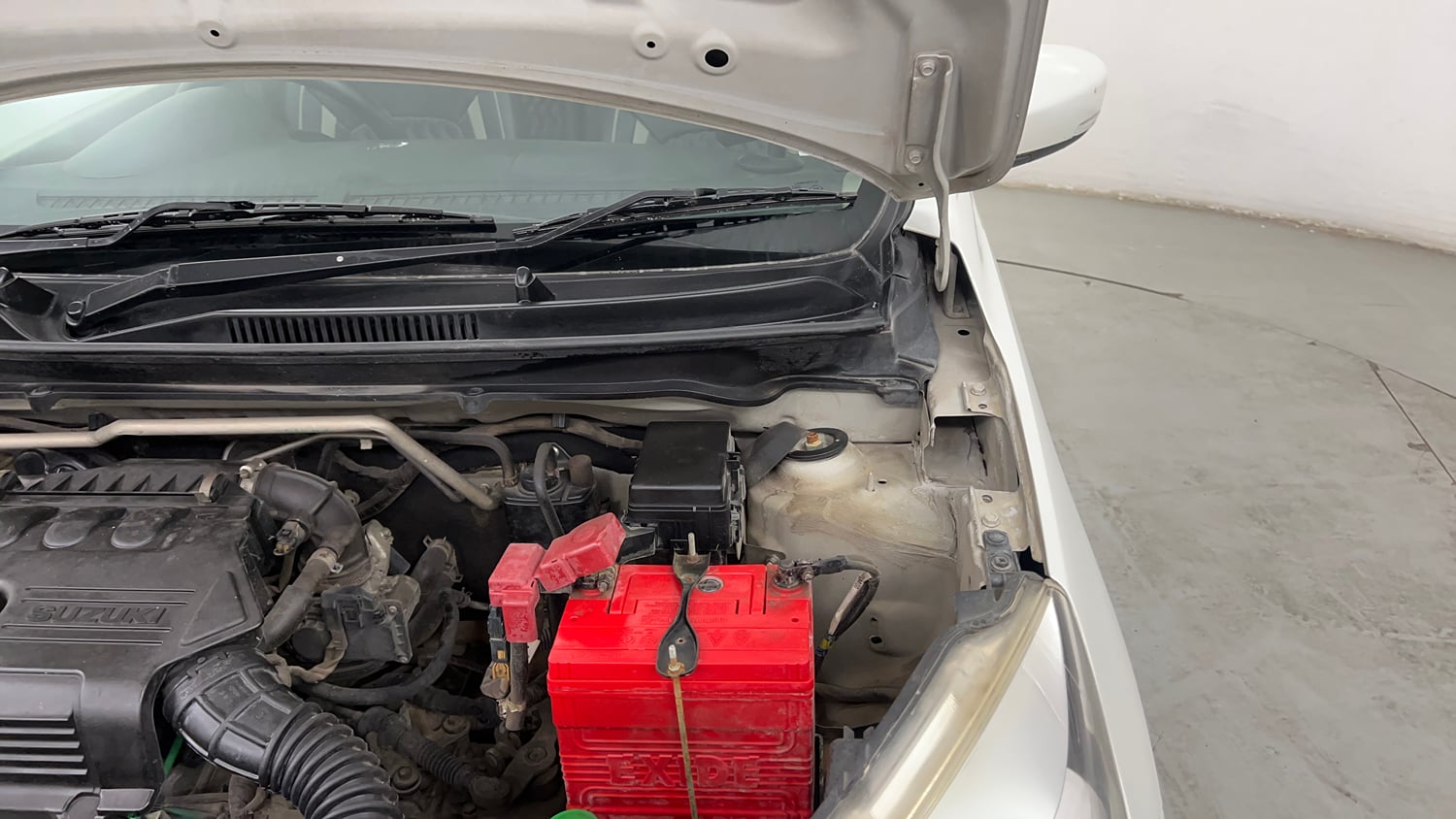 Used 2017 Maruti Suzuki Celerio ZXi Opt Petrol Manual engine ENGINE LEFT SIDE HINGE & APRON VIEW