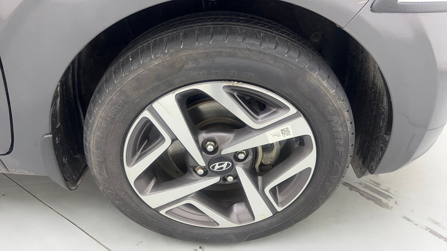 Used 2023 Hyundai Aura SX 1.2 Petrol Petrol Manual tyres RIGHT FRONT TYRE RIM VIEW