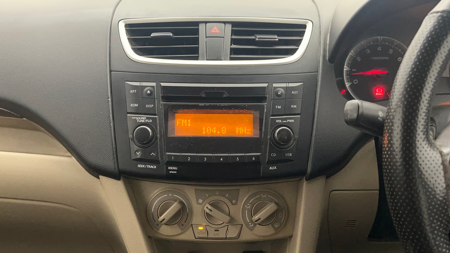 Used 2016 Maruti Suzuki Swift Dzire VXI Petrol Manual top_features Integrated (in-dash) music system