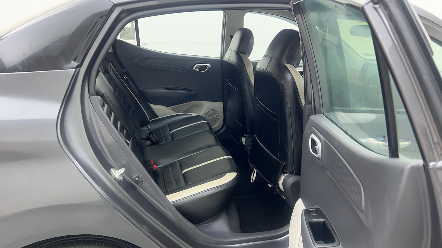 Used 2023 Hyundai Aura SX 1.2 Petrol Petrol Manual interior RIGHT SIDE REAR DOOR CABIN VIEW