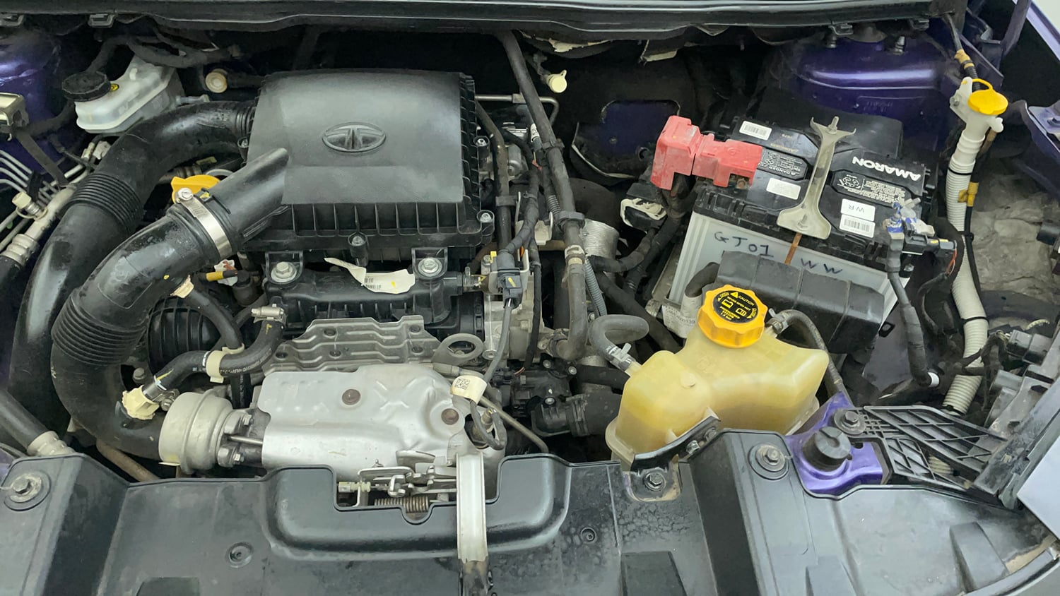 Used 2023 Tata Nexon Fearless Plus S Purple 1.2 Revotron Petrol 7DCA Dual Tone Petrol Automatic engine ENGINE LEFT SIDE VIEW