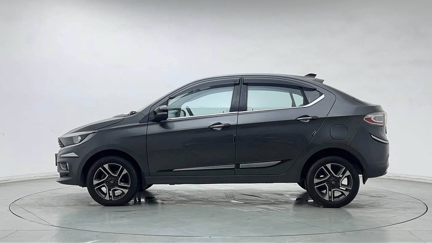 Used 2021 Tata Tigor XZ Plus Petrol Manual exterior LEFT SIDE VIEW