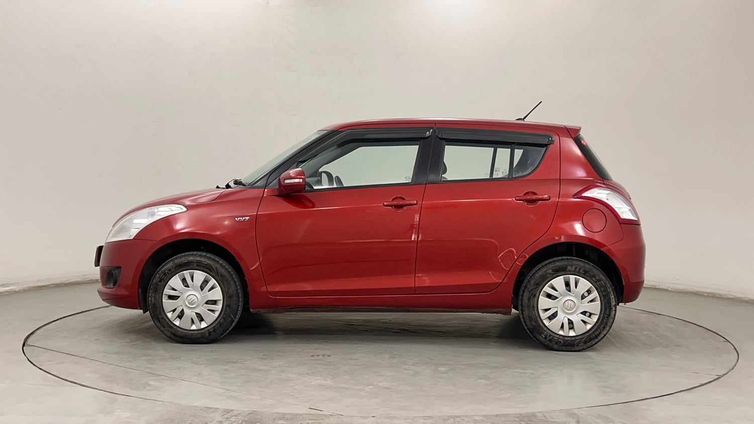 Used 2014 Maruti Suzuki Swift VXi Petrol Manual exterior LEFT SIDE VIEW