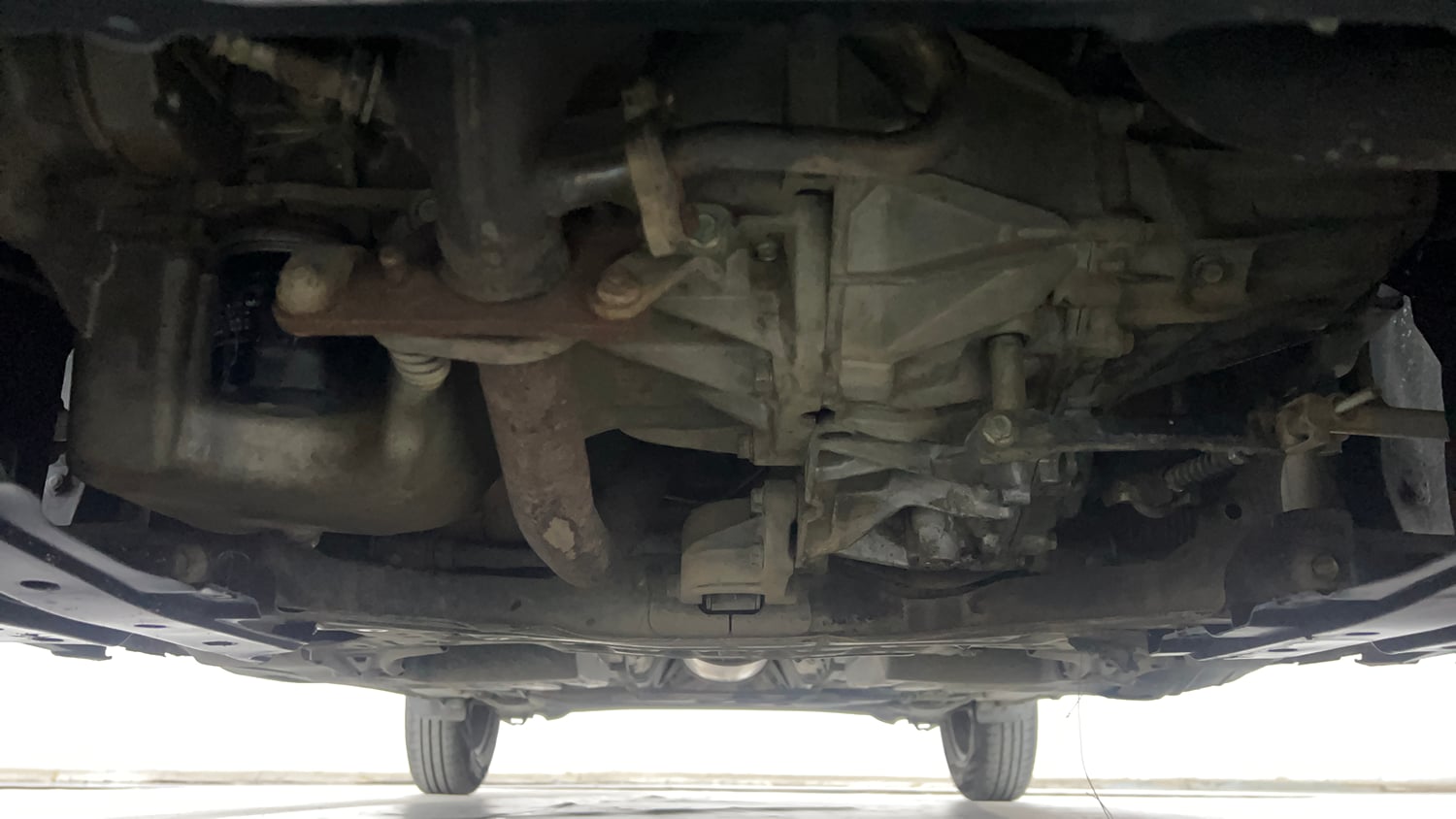 Used 2022 Maruti Suzuki Swift VXi Petrol Manual extra FRONT LEFT UNDERBODY VIEW